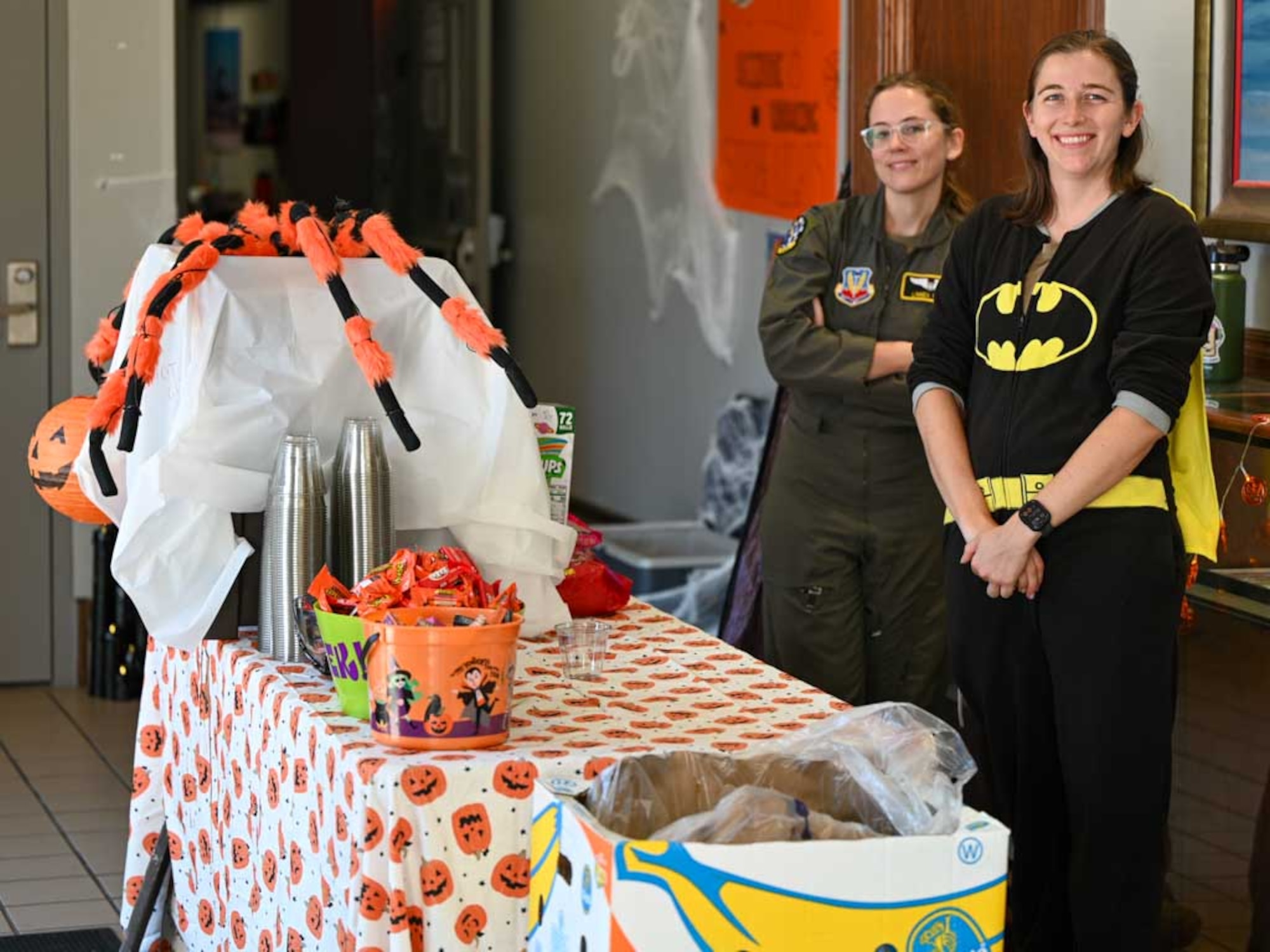 Volunteers at a candy station welcome trick-or-treaters during the 552nd Air Control Wing’s Boo Bash at Tinker Air Force Base. The Halloween-themed event provided a safe and fun environment for families to celebrate and connect with the community.
(U.S. Air Force photo by Garrett N. Cole)
