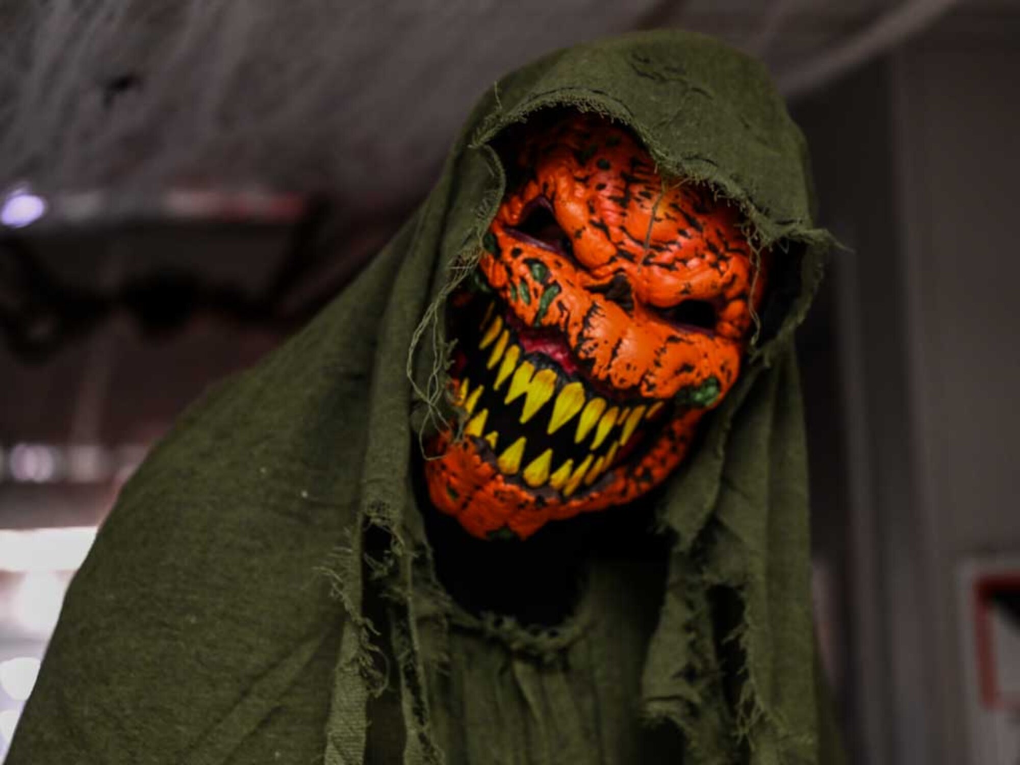 A ghoulish pumpkin mask adds to the eerie decor during the 552nd Air Control Wing’s Boo Bash at Tinker Air Force Base. The haunted house and themed displays were a favorite among attendees, bringing the Halloween spirit to life.
(U.S. Air Force photo by Garrett N. Cole)