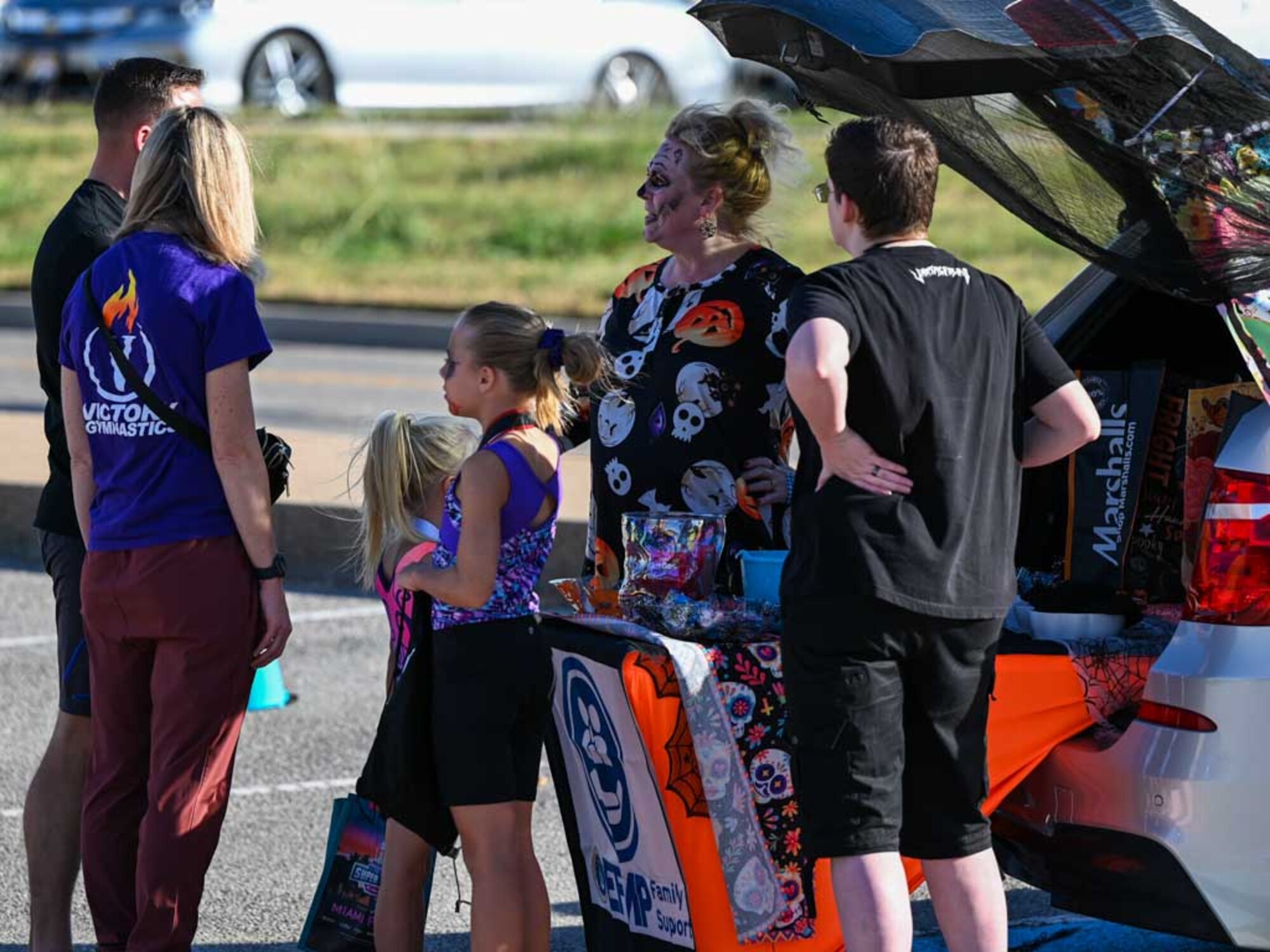Families enjoy a festive Trunk-or-Treat station during the 552nd Air Control Wing’s Boo Bash at Tinker Air Force Base. The event fostered a sense of community and provided a safe space for children to celebrate Halloween.
(U.S. Air Force photo by Garrett N. Cole)