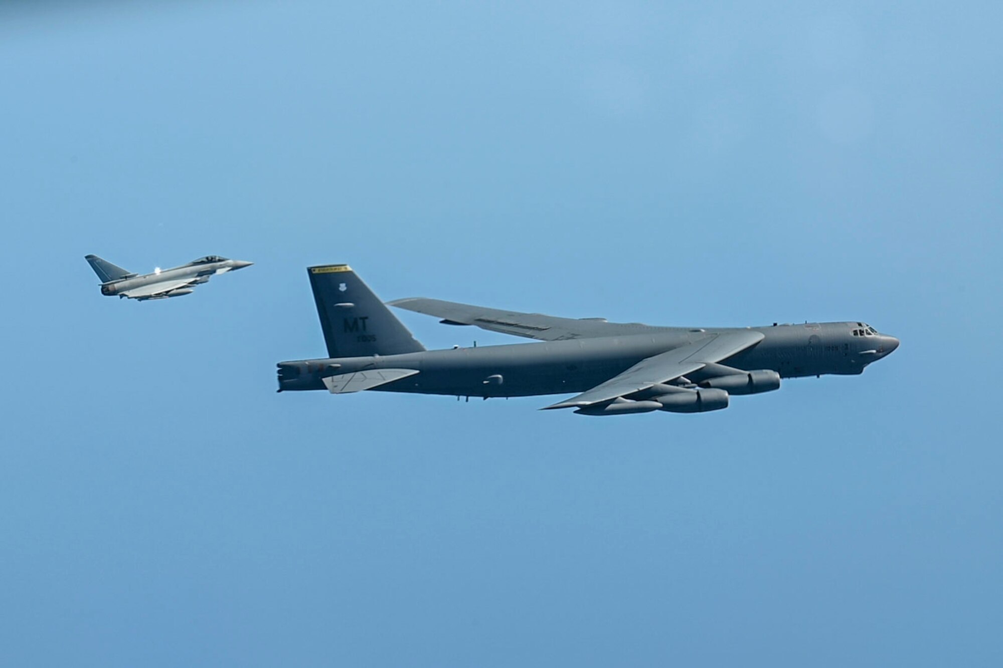 A B-52 flies with a Royal Air Force Eurofighter Typhoon