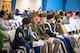 Members of the Fort Eisenhower Color Guard listen to speakers at the Martin Luther King, Jr. program at the Liberty Park Community Center in Grovetown, Ga. on January 20, 2025.