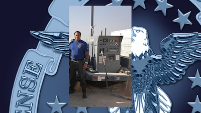 A man posed for a photo during a site visit.