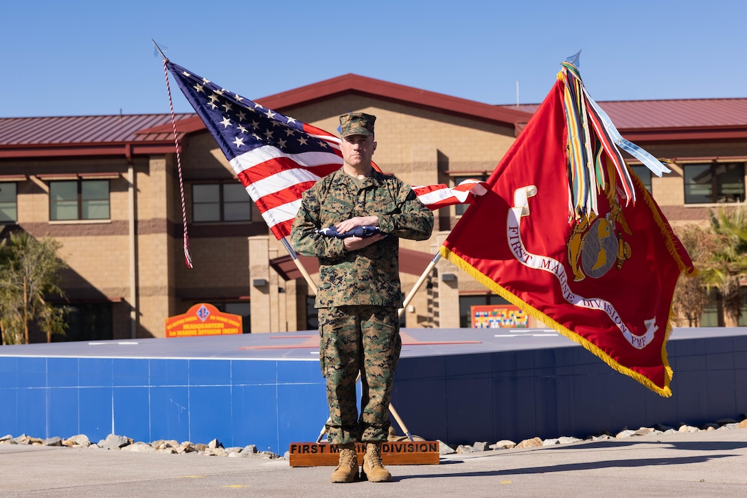 U.S. Marine Corps Sgt. Maj. Matthew J. Fouss stands during the presentation of “Old Glory” as a part of his retirement ceremony at Marine Corps Base Camp Pendleton, California, Jan. 16, 2025.