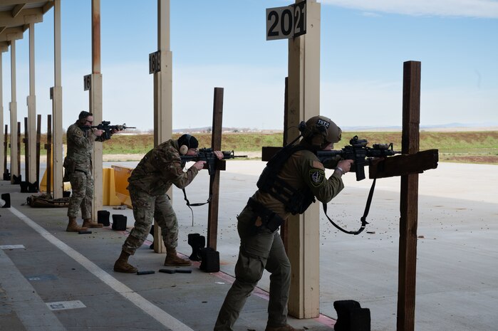 U.S. Air Force Airmen from the 9th Reconnaissance Wing use M4 carbines to fire at mobile robot targets at Beale Air Force Base, California, Jan. 13, 2025.