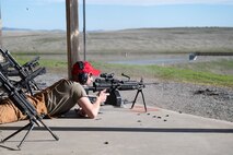 U.S. Air Force Senior Airman Brandon Goetz, 9th Security Forces Squadron (SFS) Combat Arms Training and Maintenance instructor, fires an M249 light machine gun at Beale Air Force Base, California, Jan. 14, 2025.