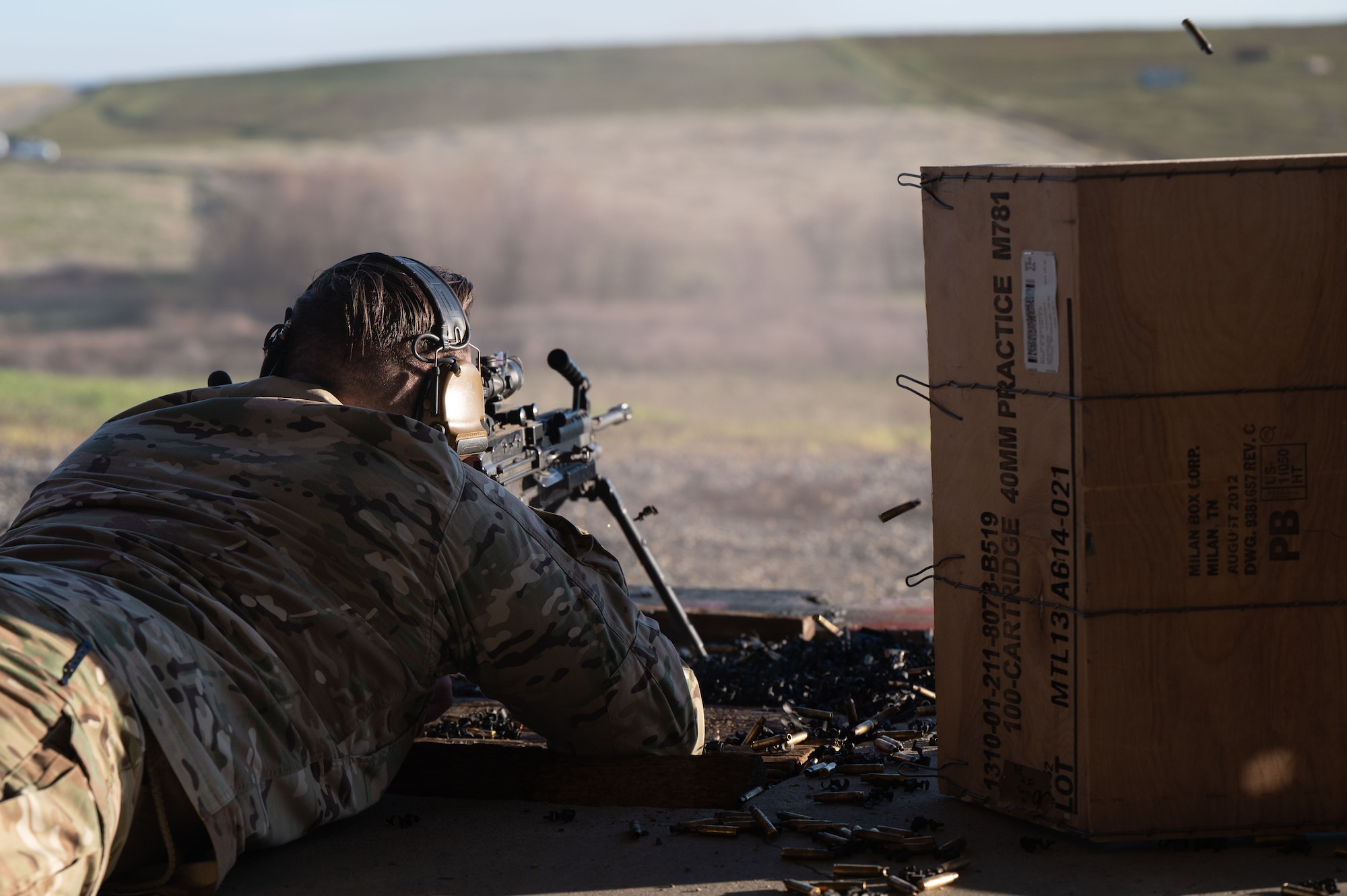 U.S. Air Force Capt. James Stocks, 9th Security Forces Squadron (SFS) commander fires an M249 light machine gun at Beale Air Force Base, California, Jan. 14, 2025.