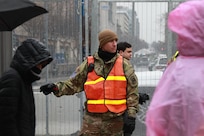 U.S. Army Staff Sgt. Sawyer Myers, a member of the 265th Air Defense Artillery Battalion, Florida Army National Guard, attached to Joint Task Force-District of Columbia (JTF-DC), directs foot traffic in support of the 60th Presidential Inauguration in Washington, D.C., Jan. 19, 2025. Approximately 8,000 National Guard service members from approximately 40 states and territories comprise JTF-DC to support the 60th Presidential Inauguration, continuing a legacy that began in 1789 when their predecessors escorted George Washington to the first inauguration. At the request of civil authorities, these National Guard service members provide critical support such as crowd management, traffic control points, CBRN response, civil disturbance response, and sustainment operations. Their expertise and seamless collaboration with interagency partners help ensure a safe and peaceful transition of power during this historic event.