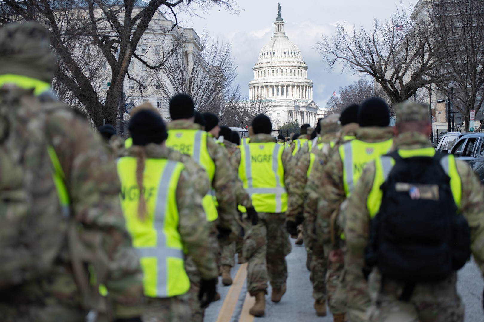 Idaho National Guard Soldiers and Airmen attached to Joint Task Force District of Columbia (JTF-DC) walk to their assigned crowd control points in Washington, D.C., Jan. 20, 2025. Approximately 8,000 National Guard service members from approximately 40 states, territories, and the District of Columbia comprise JTF-DC to support the 60th Presidential Inauguration, continuing a legacy that began in 1789 when their predecessors escorted George Washington to the first inauguration. At the request of civil authorities, these National Guard service members provide critical support such as crowd management, traffic control points, CBRN response, civil disturbance response, and sustainment operations. Their expertise and seamless collaboration with interagency partners help ensure a safe and peaceful transition of power during this historic event.