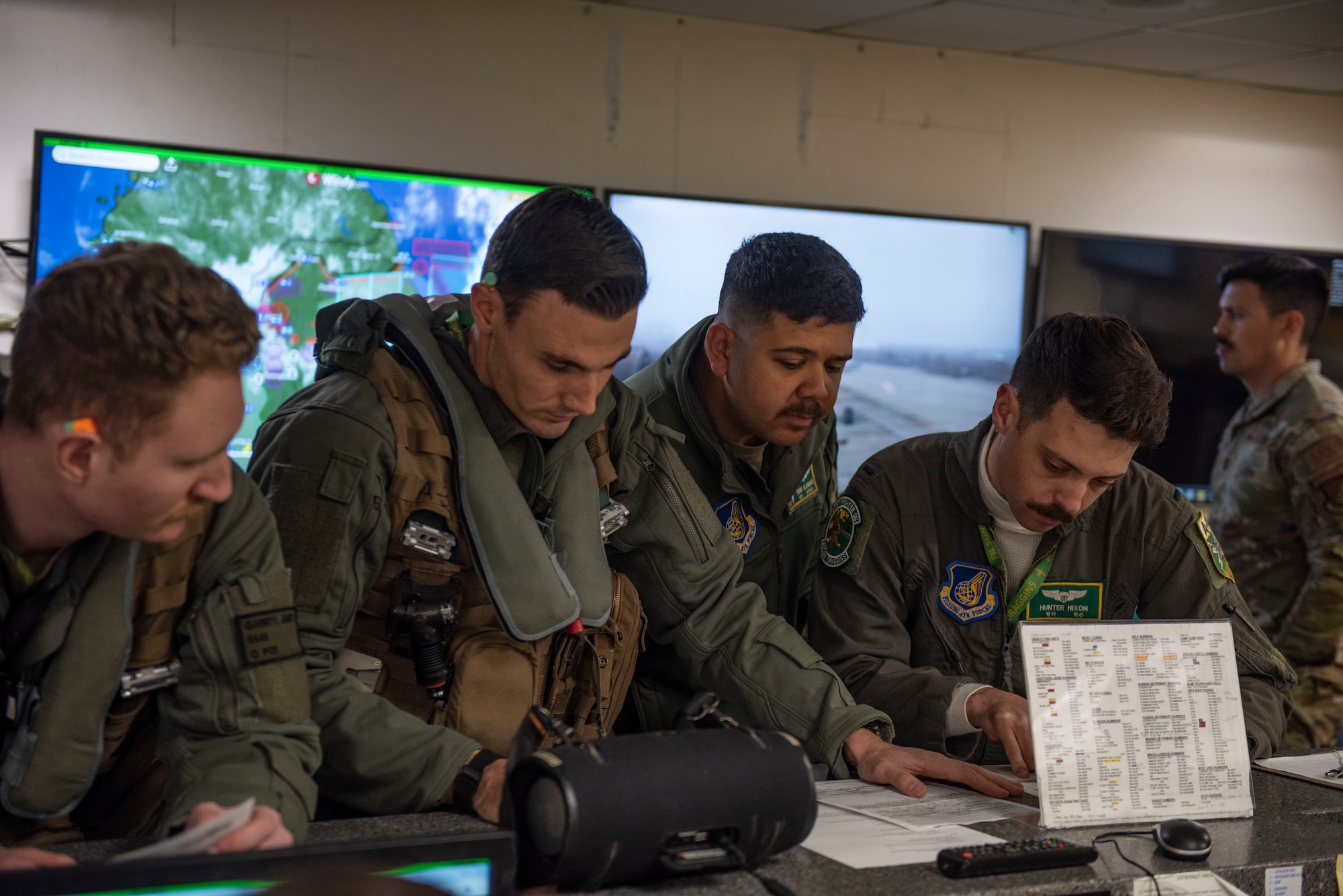 U.S. Air Force A-10 Thunderbolt II pilots assigned to the 25th Fighter Squadron conduct pre-flight planning, at Osan Air Base
