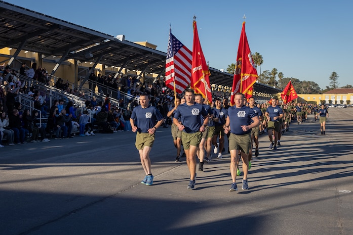 U.S. Marines with Recruit Training Regiment, Marine Corps Recruit Depot San Diego, lead a motivational run at MCRD San Diego, California, Jan. 16, 2025. The company motivational run is a three-mile cadence run conducted around the Depot and is the last physical training event the Marines will conduct before they graduate from MCRD San Diego. The event is also the first-time friends and families will see their newly transformed Marines. Most ready when our nation is least ready, we train Marines to defeat the challengers, obstacles, and potential adversaries that hinder our nation’s progress and threaten our peace and security. (U.S. Marine Corps photo by Lance Cpl. Jacob Hutchinson)