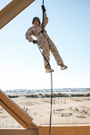 A U.S. Marine with Lima Company, 3rd Recruit Training Battalion, descends the rappel tower at Marine Corps Recruit Depot San Diego, California, Jan. 10, 2025. The rappel tower provides opportunities for the new Marines to gain confidence in themselves and their gear and is one of the last training events Marines will conduct while at MCRD San Diego. Most ready when our nation is least ready, we train Marines to defeat the challengers, obstacles, and potential adversaries that hinder our nation’s progress and threaten our peace and security. (U.S. Marine Corps photo by Cpl. Sarah M. Grawcock)