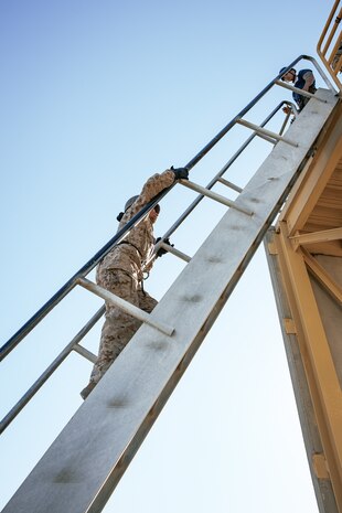 U.S. Marines with Lima Company, 3rd Recruit Training Battalion, ascends to the top of the rappel tower at Marine Corps Recruit Depot San Diego, California, Jan. 10, 2025. The rappel tower provides opportunities for the new Marines to gain confidence in themselves and their gear and is one of the last training events Marines will conduct while at MCRD San Diego. Most ready when our nation is least ready, we train Marines to defeat the challengers, obstacles, and potential adversaries that hinder our nation’s progress and threaten our peace and security. (U.S. Marine Corps photo by Cpl. Sarah M. Grawcock)