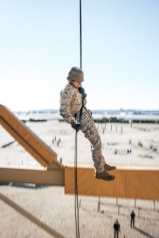 A U.S. Marine with Lima Company, 3rd Recruit Training Battalion, descends the rappel tower at Marine Corps Recruit Depot San Diego, California, Jan. 10, 2025. The rappel tower provides opportunities for the new Marines to gain confidence in themselves and their gear and is one of the last training events Marines will conduct while at MCRD San Diego. Most ready when our nation is least ready, we train Marines to defeat the challengers, obstacles, and potential adversaries that hinder our nation’s progress and threaten our peace and security. (U.S. Marine Corps photo by Cpl. Sarah M. Grawcock)