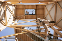 U.S. Marines with Lima Company, 3rd Recruit Training Battalion, descend the rappel tower at Marine Corps Recruit Depot San Diego, California, Jan. 10, 2025. The rappel tower provides opportunities for the new Marines to gain confidence in themselves and their gear and is one of the last training events Marines will conduct while at MCRD San Diego. Most ready when our nation is least ready, we train Marines to defeat the challengers, obstacles, and potential adversaries that hinder our nation’s progress and threaten our peace and security. (U.S. Marine Corps photo by Cpl. Sarah M. Grawcock)
