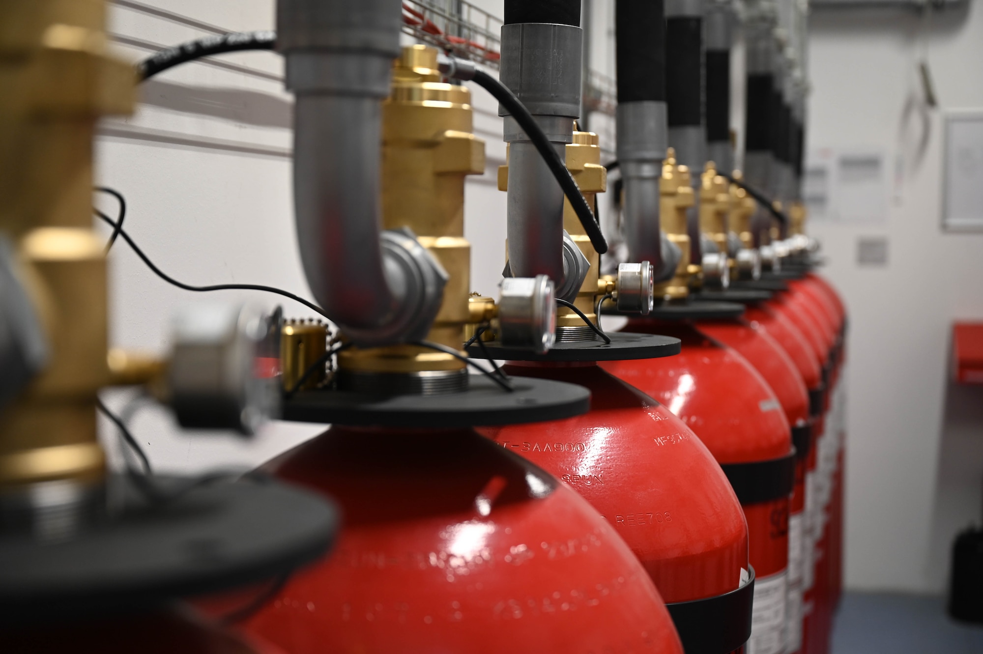 A fire suppression system is lined up against a wall