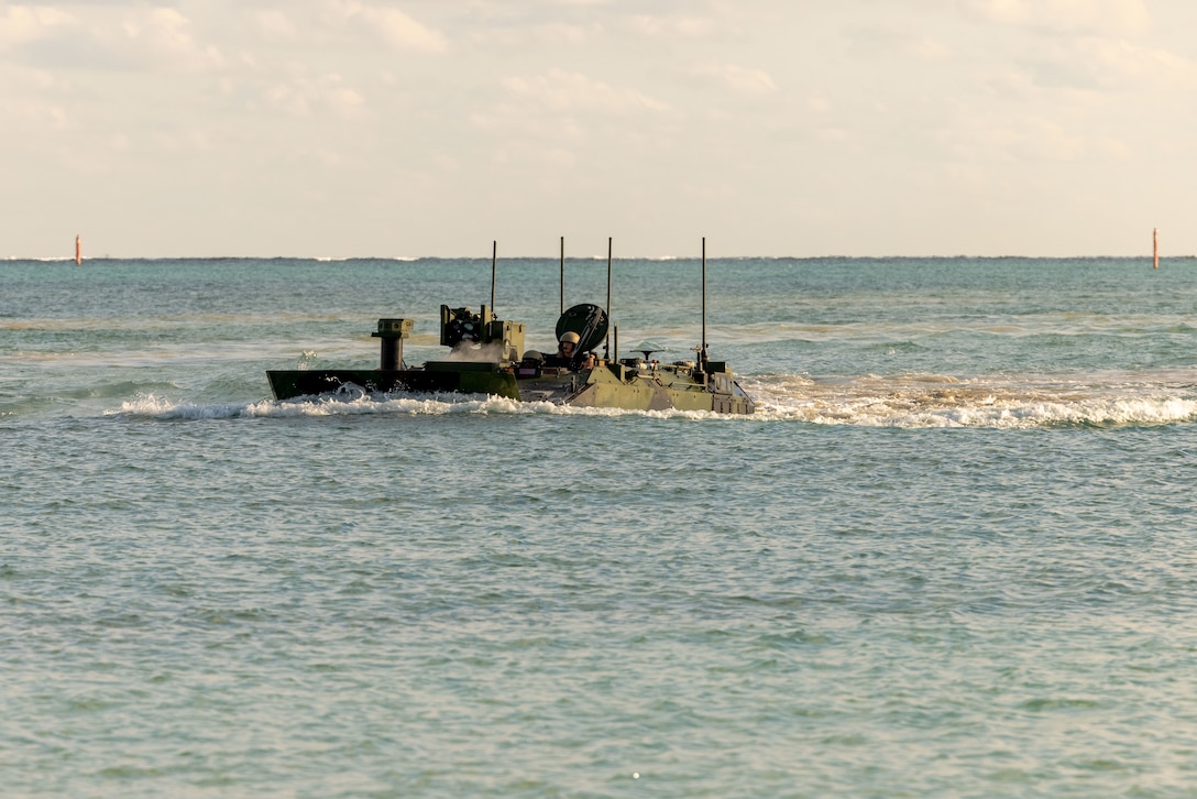 U.S. Marines operating an Amphibious Combat Vehicle (ACV) complete an amphibious landing from Kushi Crossing to Camp Schwab, Okinawa, Japan, Dec. 10, 2024. This was the first open-water amphibious movement for ACVs deployed to III Marine Expeditionary Force, accomplishing a new milestone for amphibious operations with the vehicle platform in the Indo-Pacific. Amphibious operations, including the use of ship-to-shore connectors, is a foundational aspect of Marine Corps operations and is critical to remaining the Nation’s premier expeditionary force in readiness. The Marines shown are with 4th Marine Regiment, 3d Marine Division. (U.S. Marine Corps photo by Lance Cpl. Kendrick Jackson)