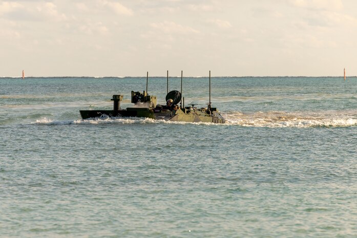 U.S. Marines operating an Amphibious Combat Vehicle (ACV) complete an amphibious landing from Kushi Crossing to Camp Schwab, Okinawa, Japan, Dec. 10, 2024. This was the first open-water amphibious movement for ACVs deployed to III Marine Expeditionary Force, accomplishing a new milestone for amphibious operations with the vehicle platform in the Indo-Pacific. Amphibious operations, including the use of ship-to-shore connectors, is a foundational aspect of Marine Corps operations and is critical to remaining the Nation’s premier expeditionary force in readiness. The Marines shown are with 4th Marine Regiment, 3d Marine Division. (U.S. Marine Corps photo by Lance Cpl. Kendrick Jackson)