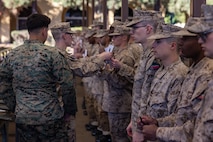 U.S. Marine Corps recruits with Delta Company, 1st Recruit Training Battalion, turn in their paperwork during an M16A4 service rifle issue at Marine Corps Recruit Depot San Diego, California, Jan. 13, 2025. Recruits were issued rifles and briefed on their responsibilities regarding rifle security, safety and handling. Marines are warfighters first, and always. Every Marine is a rifleman, and a Marine officer is a rifle platoon commander. This unique characteristic distinguishes Marines from all services, at home and abroad. (U.S. Marine Corps photo by Lance Cpl. Jacob B. Hutchinson)
