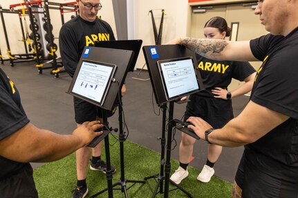 U.S. Army Sgt. Michael Bourguillon, participant, Walter Reed Army Institute of Research (WRAIR)-West, Staff Sgt. Jordan Kesseler, participant, WRAIR-West, Spc. Amanda Pinkston, participant, WRAIR-West, and Sgt. Brenden Lopez, participant, WRAIR-West, begin BET-HIIT tasks during the BET-HIIT study at 17th Fires Holistic Health and Fitness, Joint Base Lewis-McChord, Washington, October 2, 2024. The BET-HIIT study, run by WRAIR-West, is a form of intermixed brain-endurance training (BET) within a Service Member’s physical training program. It focuses on brain health and performance optimization. 

(U.S. Army photo by Christopher Nititham and Hannah Covington/RELEASED)
