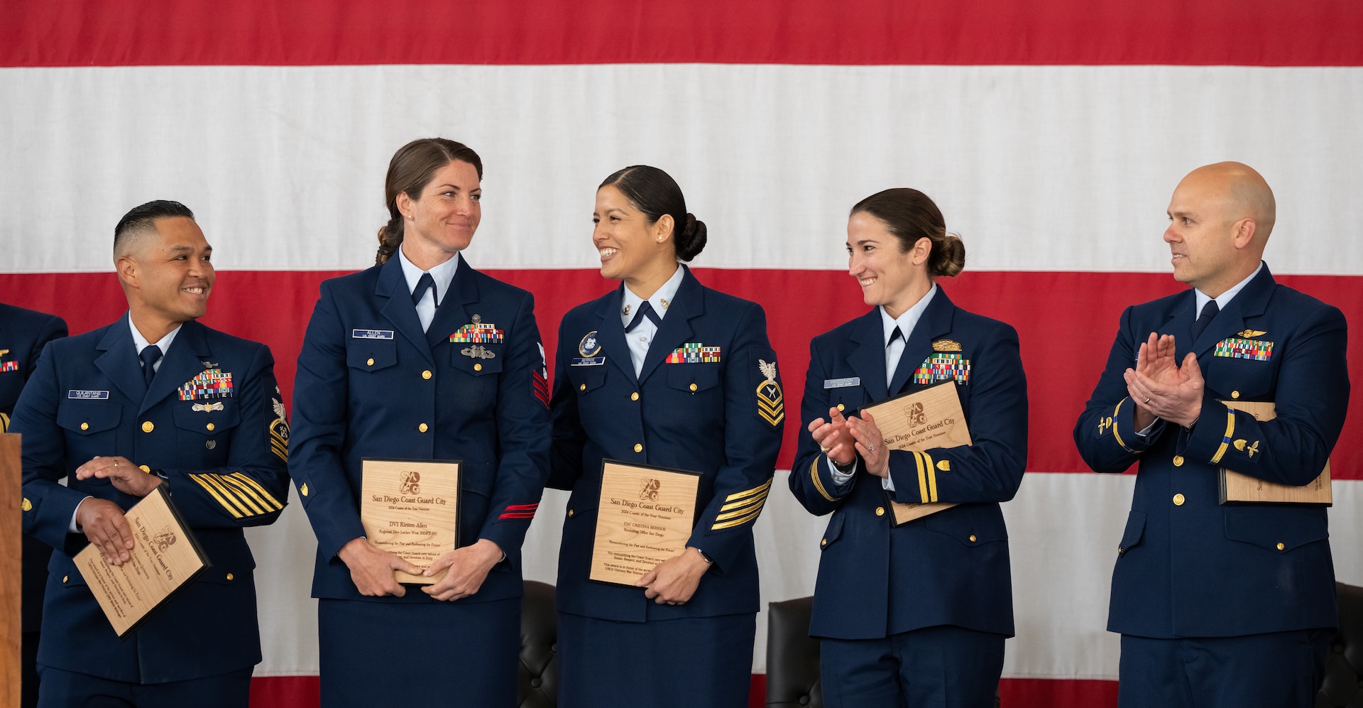 The Coastie of the Year nominees cheer for U.S. Coast Guard Petty Officer 1st Class Kirsten Allen, a Regional Dive Locker West (MSRT-W) diver, as she is announced the winner at Sector San Diego, Jan. 22, 2025.