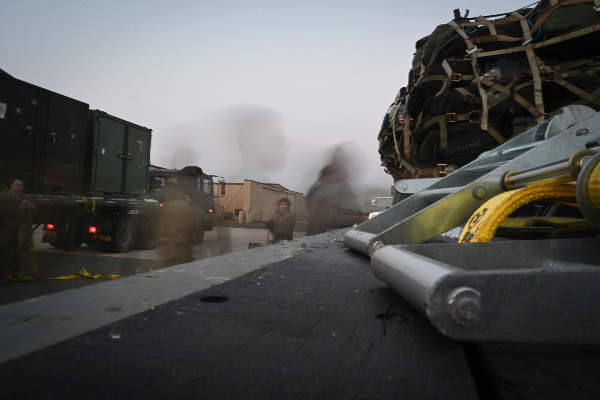 Airmen from the 8th Maintenance Group and the 35th Fighter Generation Squadron unload cargo from a truck from Kunsan Air Base for Beverly Pack 25-1 at Gwangju Air Base, Republic of Korea, Jan. 12, 2025.