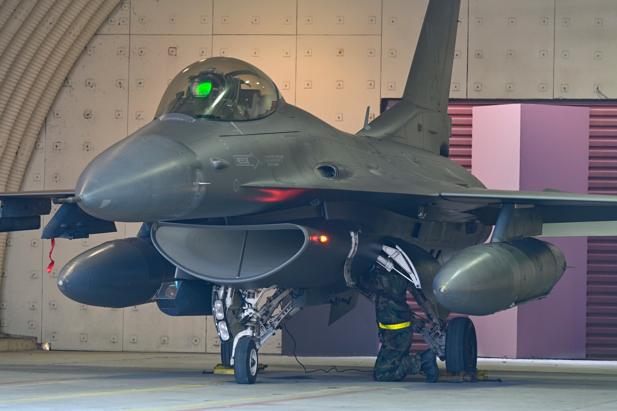 Airman 1st Class Layne Veldhuizen, 35th Fighter Generation Squadron assistant dedicated crew chief, conducts final inspections on an F-16 Fighting Falcon prior to taxiing during Exercise Beverly Pack 25-1 at Gwangju Air Base, Republic of Korea, Jan. 14, 2025.