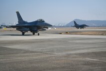 Two F-16 Fighting Falcons from the 80th Fighter Squadron arrive at Gwangju Air Base, Republic of Korea, to support Agile Combat Employment operations for exercise Beverly Pack 25-1, Jan. 13, 2025.