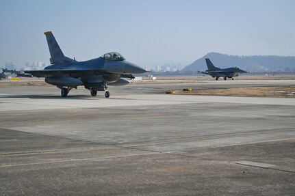 Two F-16 Fighting Falcons from the 80th Fighter Squadron arrive at Gwangju Air Base, Republic of Korea, to support Agile Combat Employment operations for exercise Beverly Pack 25-1, Jan. 13, 2025.