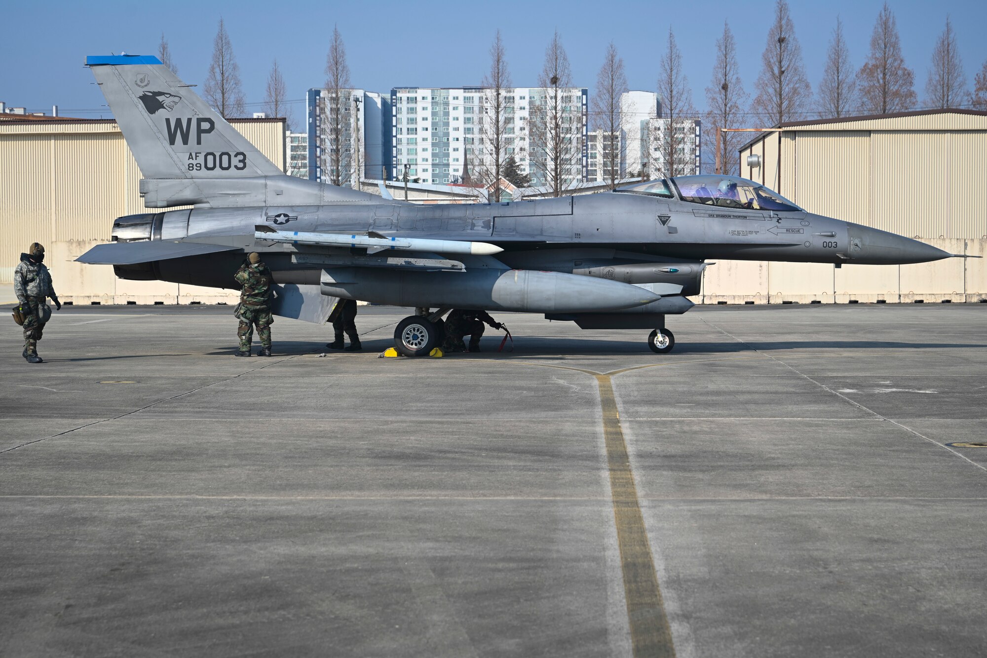 Airmen from the 8th Maintenance Group prepare an F-16 Fighting Falcon aircraft from the 35th Fighter Squadron to conduct an integrated combat turn upon arriving at Gwangju Air Base, Republic of Korea, Jan. 13, 2025.