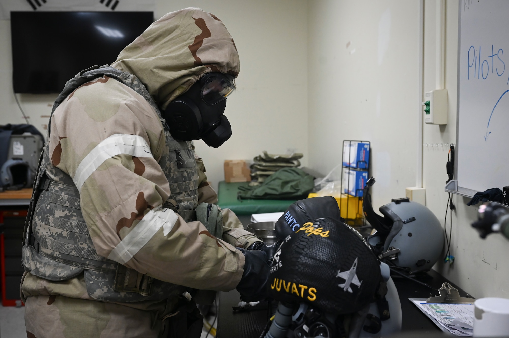 Senior Airman Jonathan Bender, 8th Operations Support Squadron aircrew flight equipment journeyman, sanitizes a pilot’s helmet during Beverly Pack 25-1.