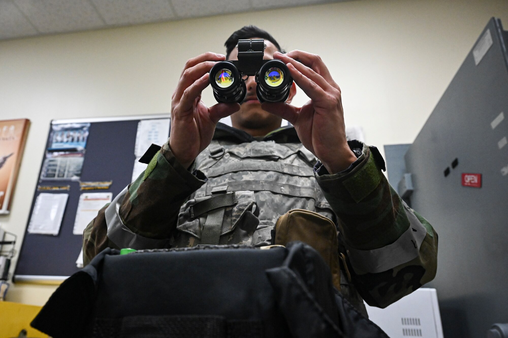 U.S. Air Force Staff Sgt. Brandon Acebo, 8th Operation Support Squadron aircrew flight equipment non-commissioned officer in charge, conducts post inspection of night vision goggles during Beverly Pack 25-1.