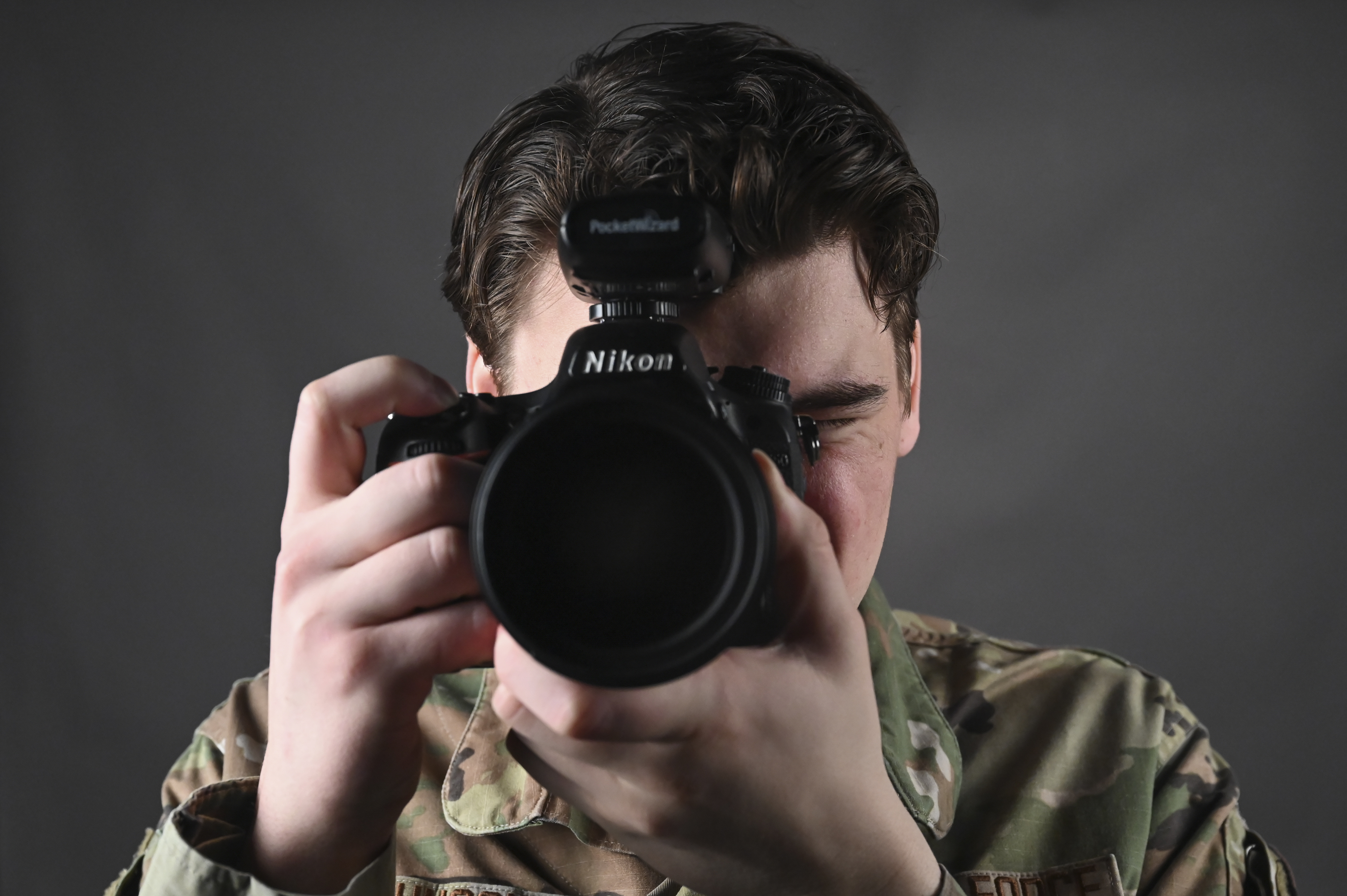Senior Airman James Johnson, 8th Fighter Wing public affairs journeyman, takes a photo.