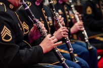 close up shot of musicians playing wind instruments
