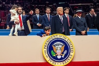President Trump, Vice President Vance and their families look at crowd
