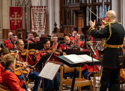 A music conductor leads an ensemble