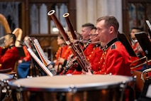 A band member performs on their instrument