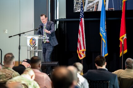 Grayson Ardies, executive director, Oklahoma Department of Aerospace and Aeronautics, speaks during the second annual OKNG UAS/LE Symposium at the Oklahoma State University Hamm Institute for American Energy in Oklahoma City, Jan. 21, 2025. Topics at the symposium included emerging UAS threats, Department of Defense and National Guard integration in advanced air mobility, maneuver training, integrating UAS in interagency operations, and counter-UAS initiative development. (Oklahoma National Guard photo by Anthony Jones)