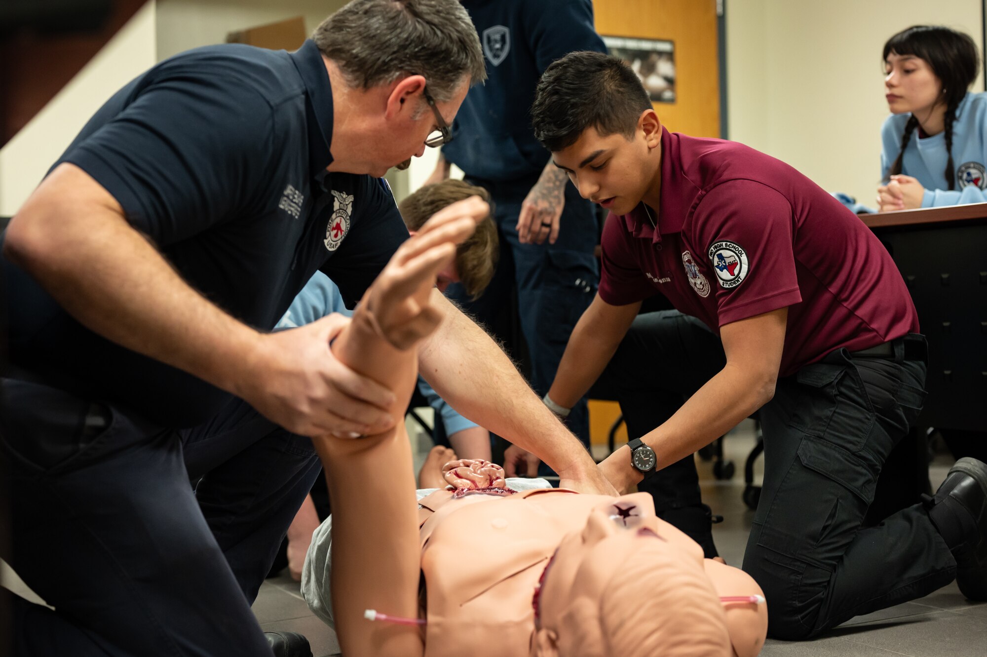 Firefighters from the 47th Civil Engineer Squadron (CES) partnered with the local Del Rio High School Emergency Medical Technician (EMT) class for a hands-on training opportunity here, Jan. 14, 2025.
