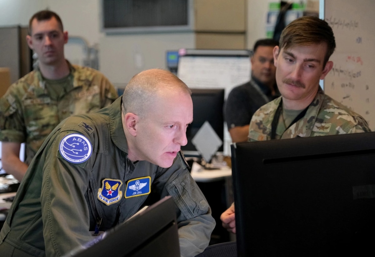 NELLIS AIR FORCE BASE, Nevada (June 28, 2024) – U.S. Air Force Col. Jonathan Zall, Department of the Air Force Advanced Battle Management Cross Functional Team, reviews experiment objectives during the Capstone 24B event at Nellis Air Force Base, Nevada, June 28, 2024. The 805th CTS, also known as the Shadow Operations Center - Nellis (ShOC-N), executed the first of two Capstone events experimenting with and developing tactics, techniques, and procedures for integrated automation between the operational and tactical command and control including battle management levels, to create competitive advantages for the United States and its allies and partners. (Courtesy Photo by Debora Henley).