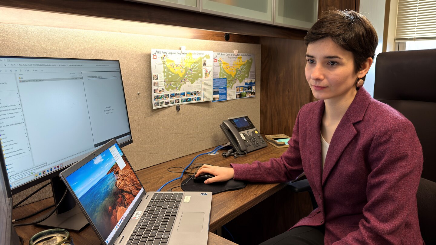 Assistant District Counsel Kathryn Morris reviews regulatory information Jan. 21, 2025, in the U.S. Army Corps of Engineers Nashville District Legal Office in Nashville, Tennessee. The Nashville District named Morris as its November 2024 Employee of the Month for her achievements while supporting several regulatory law cases. (USACE Photo by Lee Roberts)