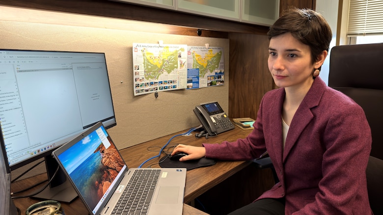Assistant District Counsel Kathryn Morris reviews regulatory information Jan. 21, 2025, in the U.S. Army Corps of Engineers Nashville District Legal Office in Nashville, Tennessee. The Nashville District named Morris as its November 2024 Employee of the Month for her achievements while supporting several regulatory law cases. (USACE Photo by Lee Roberts)