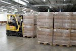 Employee in warehouse.