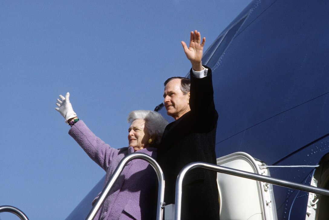 Former President George H.W. Bush and his wife Barabara give a final goodbye wave prior to boarding Air Force One. Approximately 600 well-wishers were present for their departure at Andrew Air Force Base on Inauguration Day, 20 January 1993