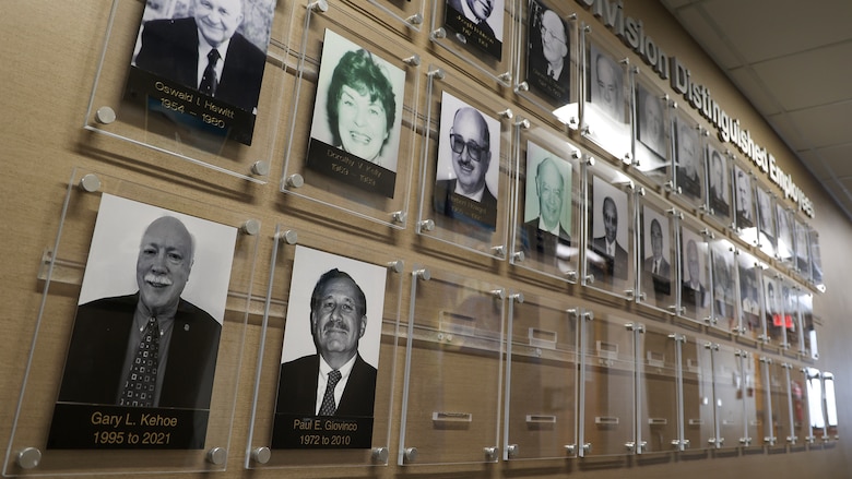 Portraits of Gary L. Kehoe and Paul Giovinco hang on display on the wall of “North Atlantic Distinguished Employees” at U.S. Army Corps of Engineers, North Atlantic Division headquarters in Brooklyn, New York. Kehoe and Giovinco were inducted into the NAD Gallery of Distinguished Civilians by Brig. Gen. John P. Lloyd, NAD commander and division engineer, during an all-hands ceremony on Jan. 21, 2025, becoming the 26th and 27th inductees selected for the honor since the gallery’s inception in the mid-1900s.