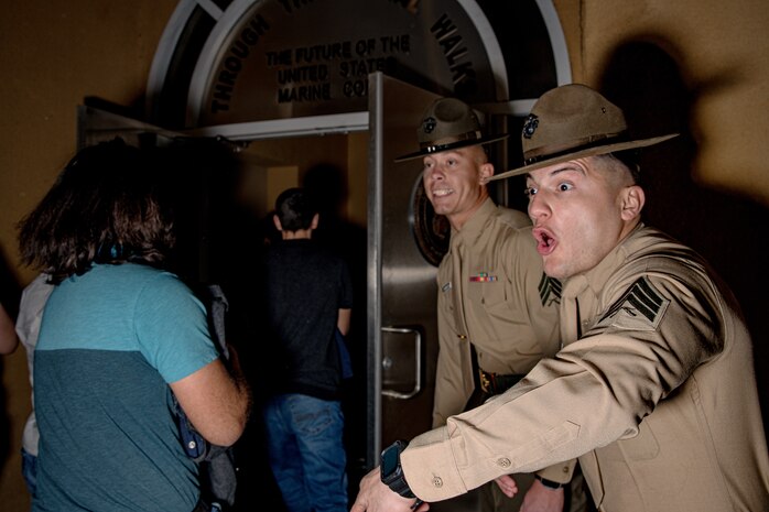 U.S. Marine Corps drill instructors with Receiving Company, Support Battalion, instruct recruits with Hotel Company, 2nd Recruit Training Battalion, off a bus as part of a receiving event at Marine Corps Recruit Depot San Diego, California, Jan. 13, 2025. During the receiving process, recruits are taken to the United States Organizations for accountability, checked for contraband, given haircuts, make a scripted phone call home, and issued gear required for training. (U.S. Marine Corps photo by Cpl. Sarah M. Grawcock)