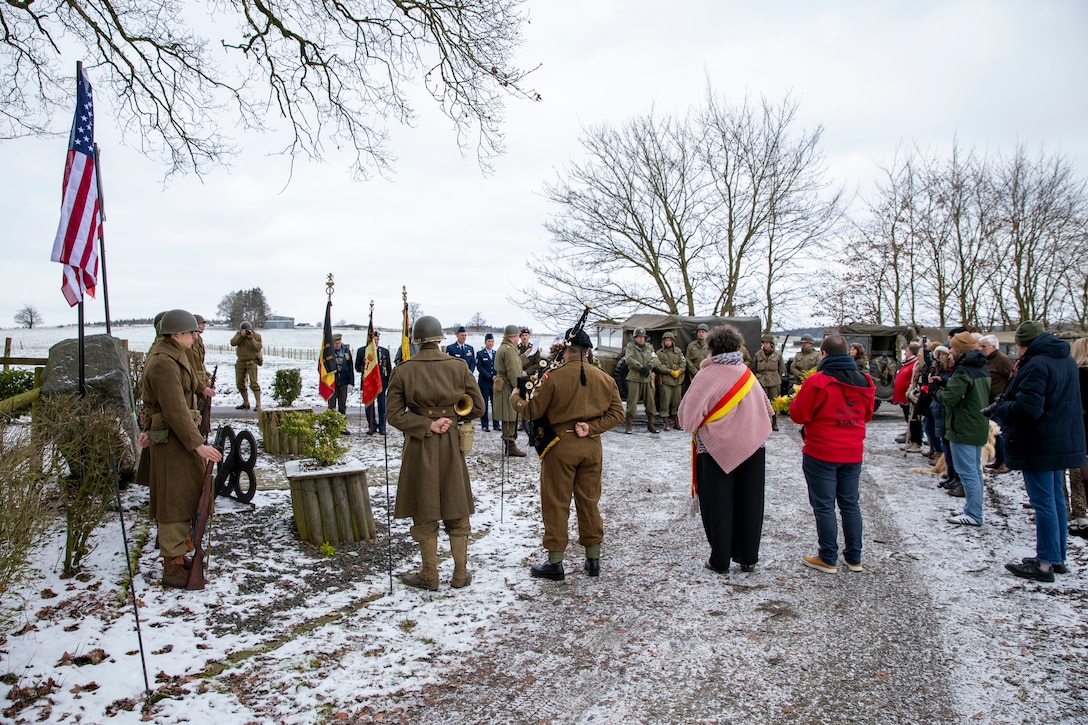 Five members of the Nebraska National Guard travelled to Bastogne, Belgium, Jan. 9-14, 2025, where they helped commemorate the 80th anniversary of the liberation of the city by Soldiers of Nebraska National Guard’s 134th Infantry Regiment under the 35th Infantry Division, during World War II. 

The service members participated in a wreath laying ceremony at a memorial honoring those who liberated the region from Nazi Germany. Joining them in the ceremony were local residents and officials from the city of Lutremange as well as the Timberwolves Remembrance Group Belgium, a reenactment group in Belgium.

The Nebraska Soldiers and Airmen also travelled to the Luxembourg American Cemetery Memorial where they visited the graves of service members laid to rest there while also placing a wreath at the grave marker for Technical Sergeant John Cantoni, a Nebraska National Guardsman from Omaha, Nebraska. Cantoni was killed in action on Jan. 4, 1944, when his foxhole was struck by German fire as he and other members of his unit were defending Bastogne. He had been with the company for less than a week after recovering from wounds he received during the Battle of St. Lo in July 1944.