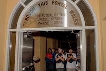 U.S. Marine Corps recruits with Hotel Company, 2nd Recruit Training Battalion, are briefed as part of a receiving event at Marine Corps Recruit Depot San Diego, California, Jan. 13, 2025. During the receiving process, recruits are taken to the United States Organizations for accountability, checked for contraband, given haircuts, make a scripted phone call home, and issued gear required for training. (U.S. Marine Corps photo by Cpl. Sarah M. Grawcock)
