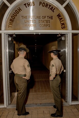 U.S. Marine Corps drill instructors with Receiving Company, Support Battalion, wait for recruits with Hotel Company, 2nd Recruit Training Battalion, as part of a receiving event at Marine Corps Recruit Depot San Diego, California, Jan. 13, 2025. During the receiving process, recruits are taken to the United States Organizations for accountability, checked for contraband, given haircuts, make a scripted phone call home, and issued gear required for training. (U.S. Marine Corps photo by Cpl. Sarah M. Grawcock)