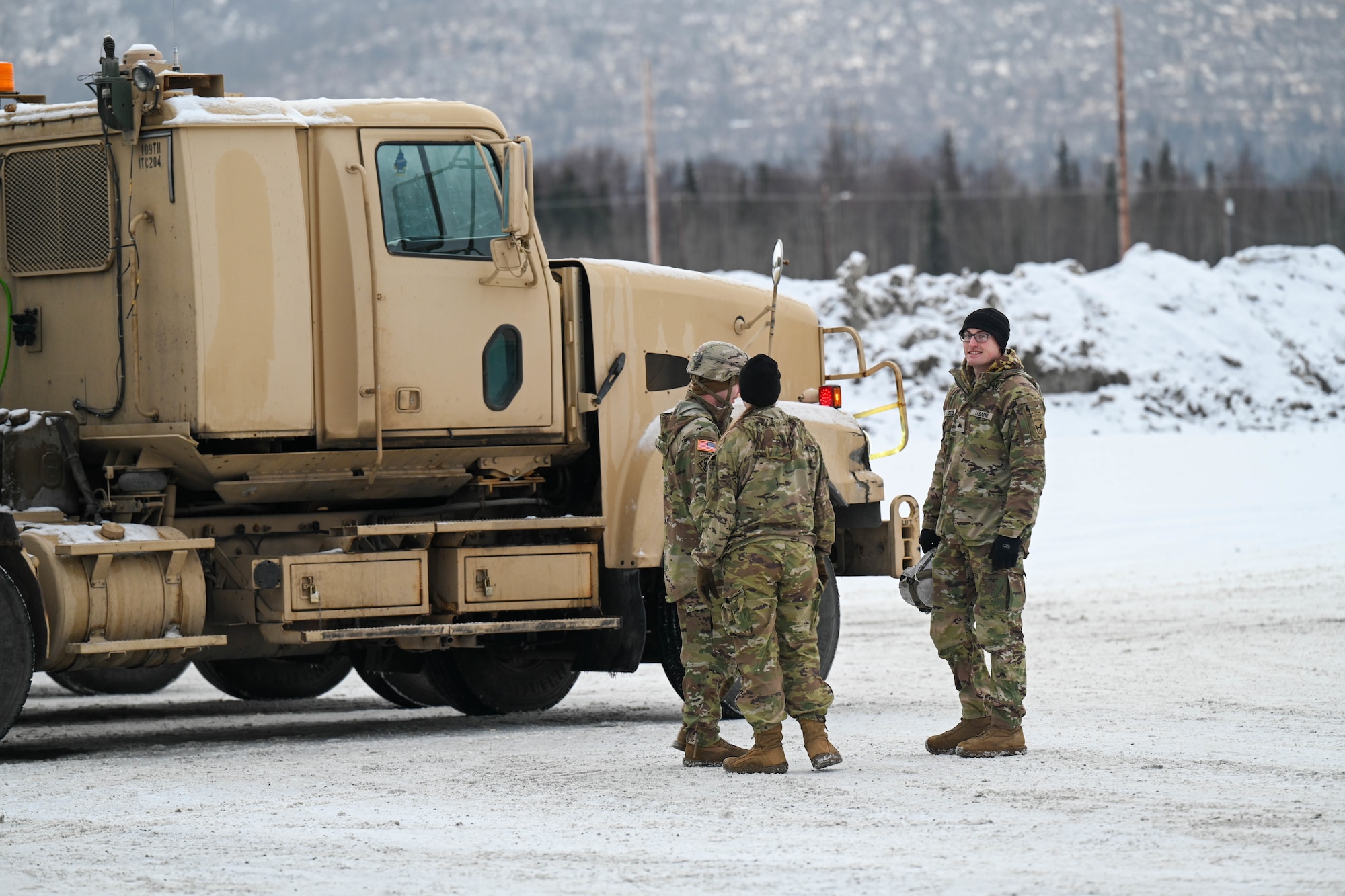 U.S. Army Soldiers from 2nd Brigade, 11th Airborne Division, organize equipment to be transferred to Fort Wainwright for the Joint Pacific Multinational Readiness Center exercise on Joint Base Elmendorf-Richardson, Alaska, Jan 6, 2025.