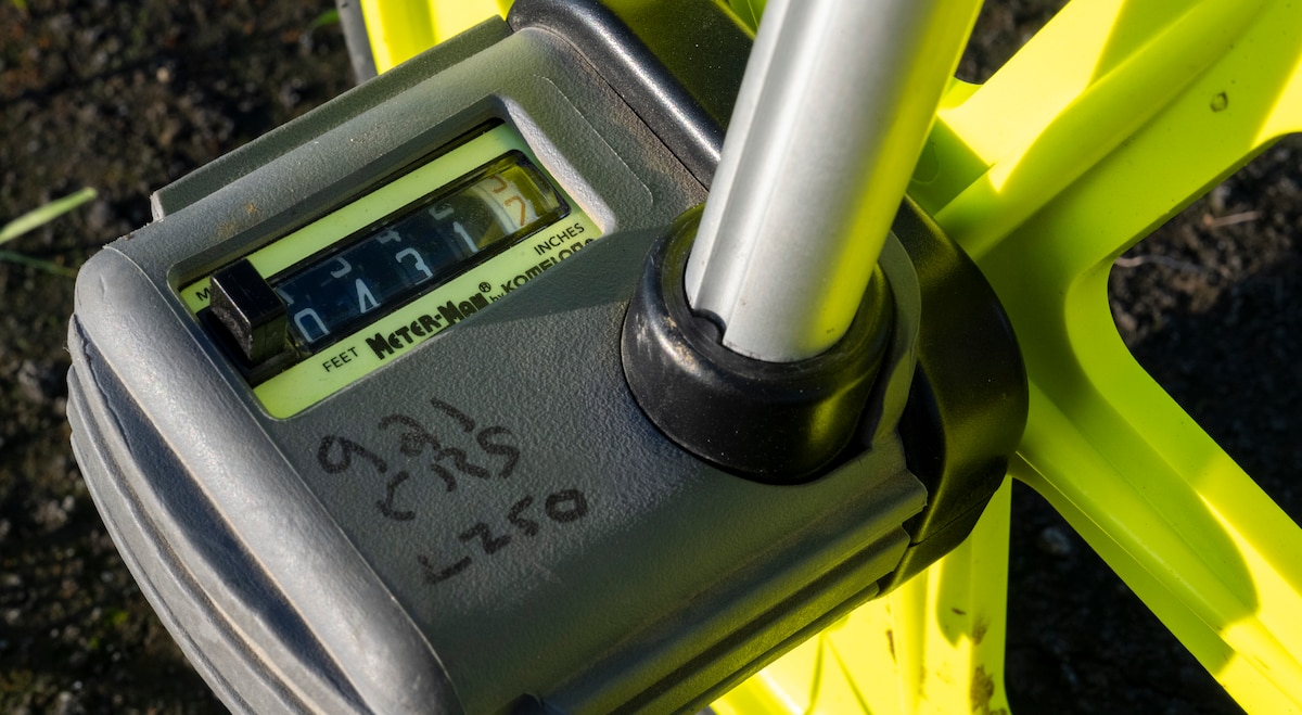 A distance measurement wheel shows the length of an unprepared flight line in Rio Vista, California, Jan. 10, 2025.